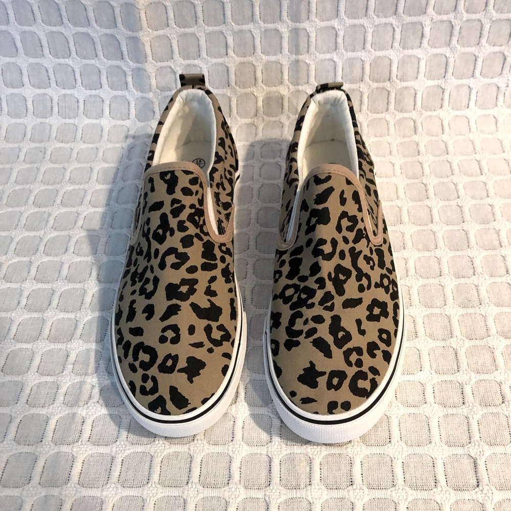 Women’s slip on canvas shoes, size 10, however, fit is more like size 9